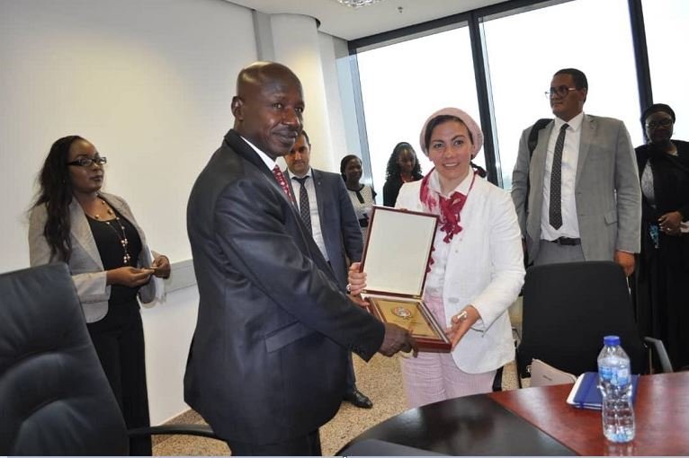 FILE PHOTO: The acting chairman, Ibrahim Magu receiving the application from Noha Amer, Interpol's Project Officer