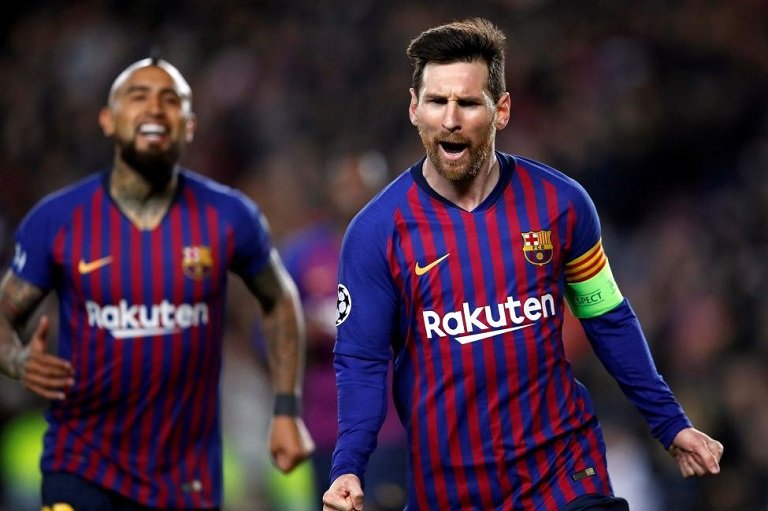 Lionel Messi celebrates after scoring against Liverpool
