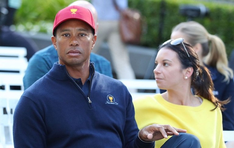 Both Tiger Woods and his girlfriend, Erica Herman (right), were named in the lawsuit