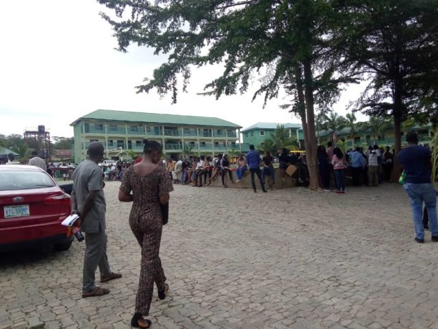 Applicants waiting to write the NNPC Computer Based Test in Kuje