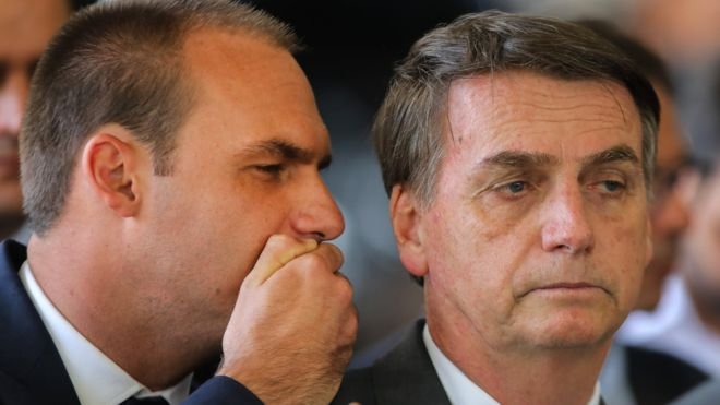 Eduardo (L), the third son of Mr Bolsonaro (R), has a strong influence on his father