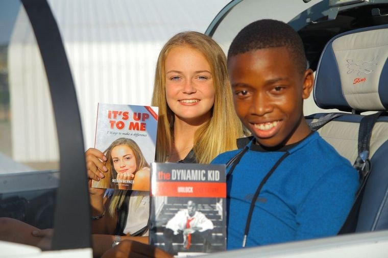 Pilot Megan Werner and Ntando were two of the 20 students that built the plane