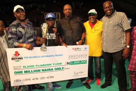 Adewunmi Ogunsanya presenting cheque at the maiden Lagos State Inter-club Boxing Challenge