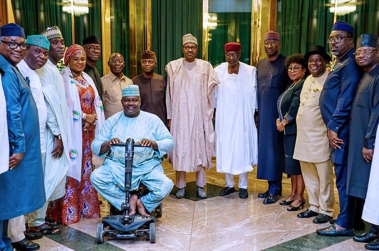 President Muhammadu Buhari and Vice President Yemi Osinbajo with NWC of the APC at the State House in Abuja,
