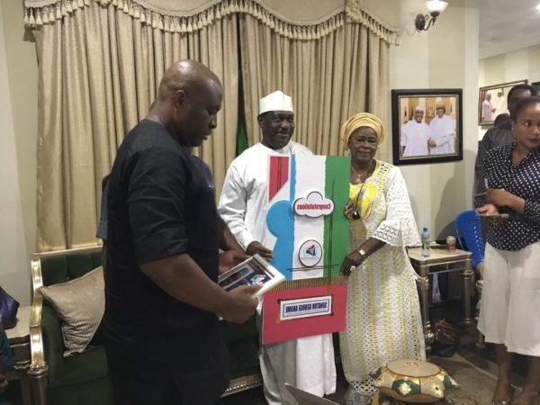 Senator George Akume receiving a certificate from the APC aspirants group from Benue