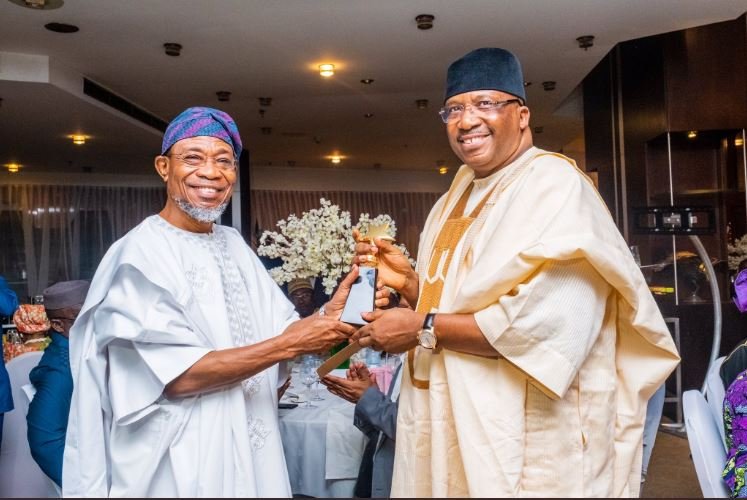 Former Minister of Interior, Lt. Gen. Abdulrahman Dambazau (R) with incumbent, Rauf Aregbesola