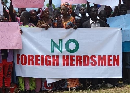 Adamawa residents kick against RUGA with No Foreign Herdsmen placard but welcome NLTP