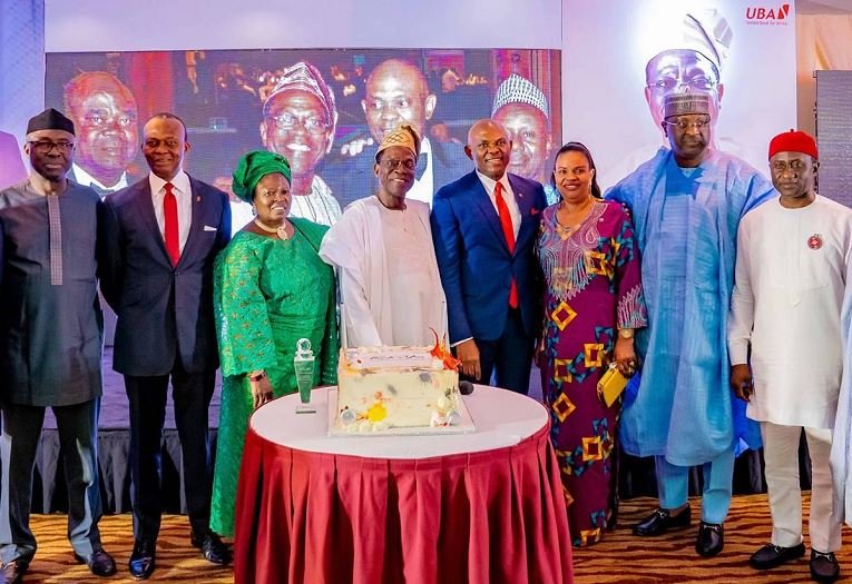 L-R: Minister of Industry, Otunba Niyi Adebayo; GMD/CEO, United Bank for Africa(UBA) Plc, Mr. Kennedy Uzoka; the celebrant and Former Director, UBA Plc, Chief Kola Jamodu and wife; Chairman, UBA Plc, Mr. Tony Elumelu; Wife of Vice Chairman, UBA Plc, Mrs Dayo Keshi; Senator Tolu Odebiyi; and Minister of State for Mines and Steel Development, Uchechukwu Ogah, during the dinner party in honour of Chief Jamodu who recently retired from the Board of the Bank, in Abuja recently