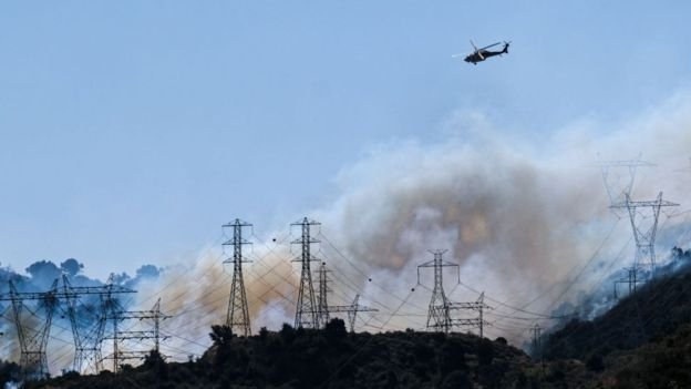 PG&E says high winds could damage its infrastructure, potentially leading to more fires