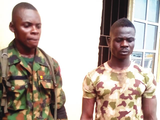 The two fake soldiers that were arrested by the Police