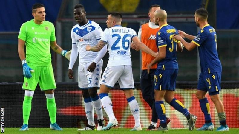 Balotelli kicked the ball into the stands after racial chants from fans