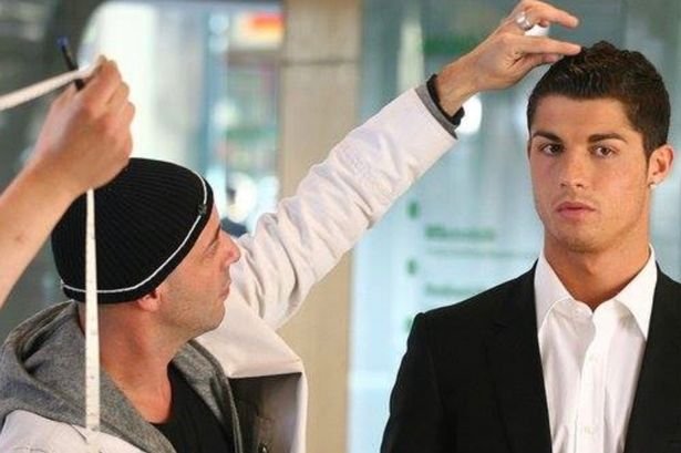 Ricardo Marques Ferreira with Cristiano Ronaldo at a photoshoot
