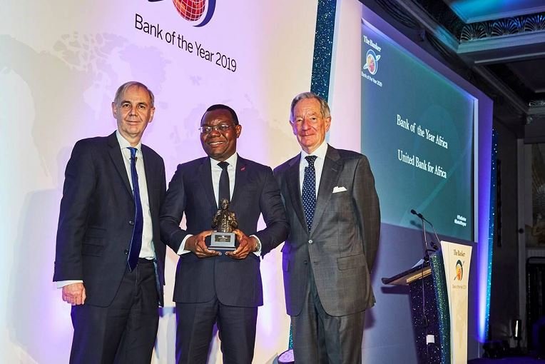 CEO, UBA Africa, Mr Victor Osadolor (middle) with the “African Bank of the Year 2019” won by United Bank for Africa(UBA) Group at The Bankers Awards held in London.