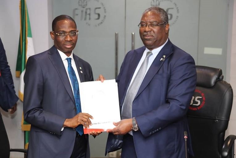 Mr. Babatunde Fowler, former Chairman, Federal Inland Revenue Service (FIRS), handing over to Mr. Abiodun Aina, Coordinating Director, FIRS, at the FIRS office on Monday