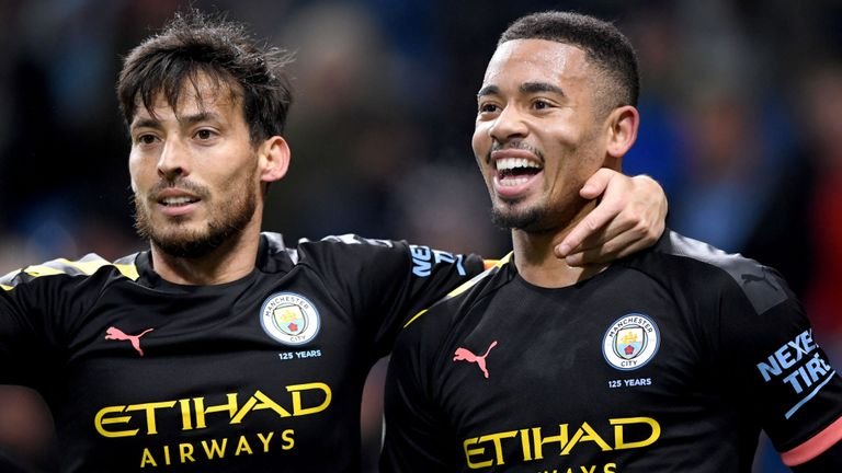 Gabriel Jesus celebrates scoring for Manchester City against Burnley with David Silva