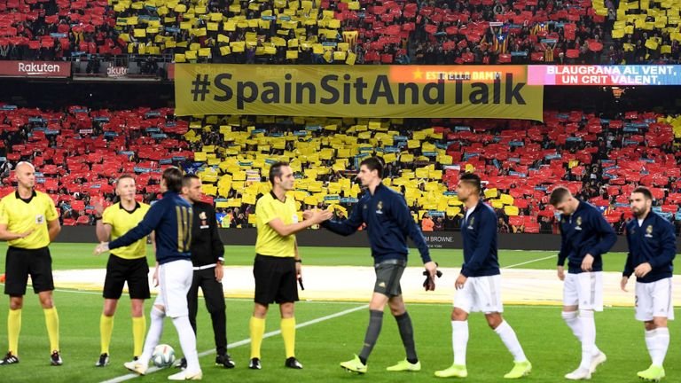 The 'Spain, sit and talk' message was on display inside the Nou Camp as well 