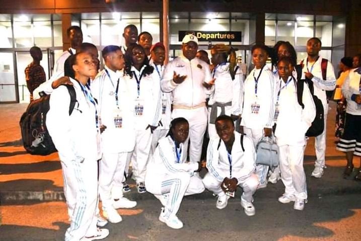 Apostle Chibuzor Chinyere (middle) with the beneficiaries at the Port Harcourt International Airport Omagwa, Rivers State before their departure for Turkey