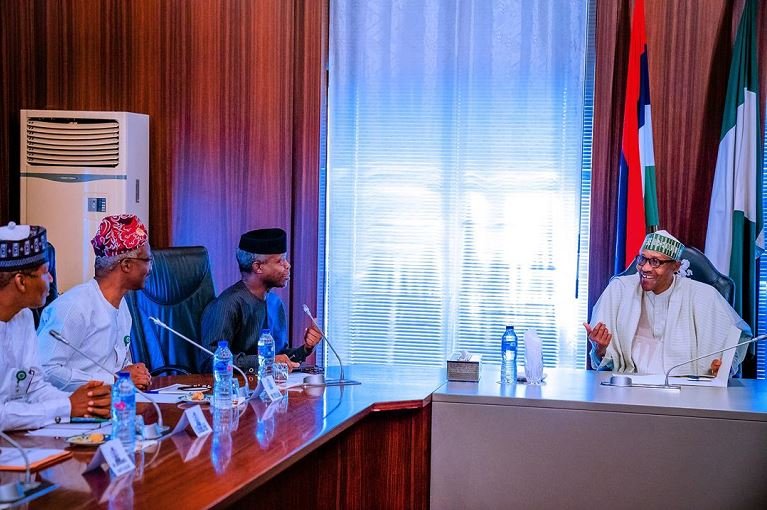 President Buhari oversees the Economic Advisory Council meeting with VP Osinbajo in attendance