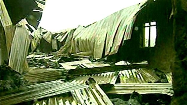 This still from archive footage shows the ruins of the church in the wake of the fire