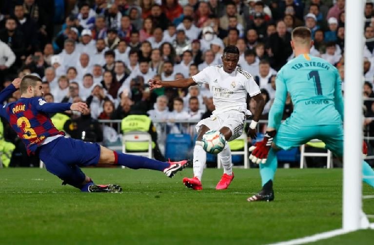 Vinicius Jr put Real Madrid in the lead after a deflection from Pique beat Ter Stegen