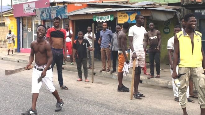 Lagos and Ogun residents have taken it upon themselves to guard their homes following fears of an attack by robbery groups