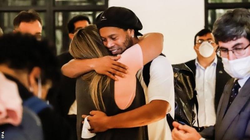 Ronaldinho was met by friends at the hotel in Asuncion