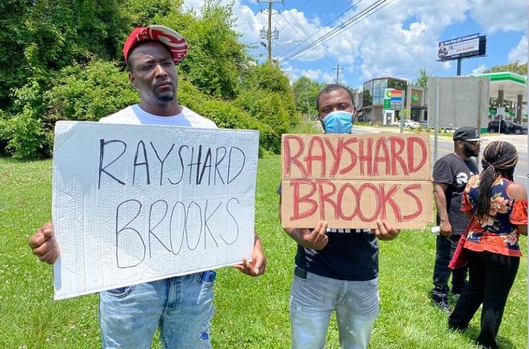 A cousin of Rayshard Brooks, Decatur Redd protest his killing