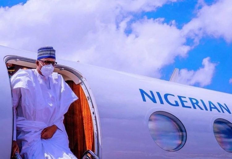 President Muhammadu Buhari wearing face mask in public for the first time