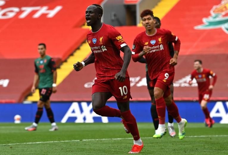 Sadio Mane scores his 20th goal for Liverpool this season