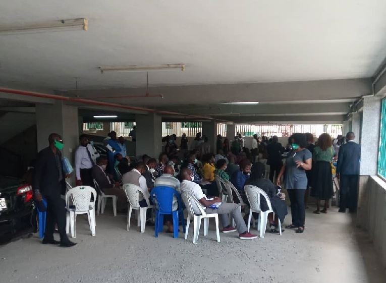 Lawyers now sit in the car park to transact 