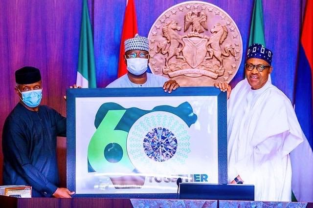 Vice President Yemi Osinbajo, SGF Boss Mustapha and President Muhammadu Buhari unveiling the Nigeria At 60 independence logo