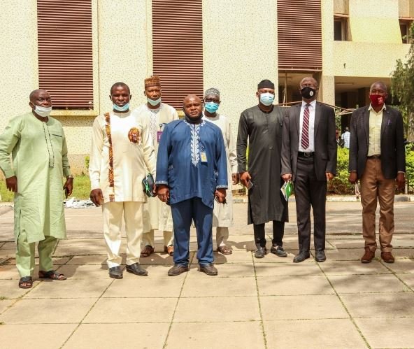 Caption: L-R Mr. Philip Ogunsakin Chairman (FCT) Nigeria Automobile Association & Informal Sector (NATA), Comrade Wisdom Okputa; State Marshal, (FCT) (NATA), Comrade Ifeanyi Chukwu Nebechi and State Secretary (FCT) (NATA), Mr. Tola Johnson, SA MSMEs, Mr. Laolu Akande, SSA Media & Publicity and Comrade Babatunde Yusuf, beneficiary of the grant. Artisans