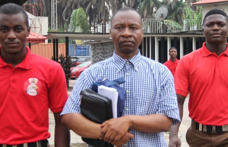 EFCC Operatives taking Ayodeju Ibrahim Oluokun to Court