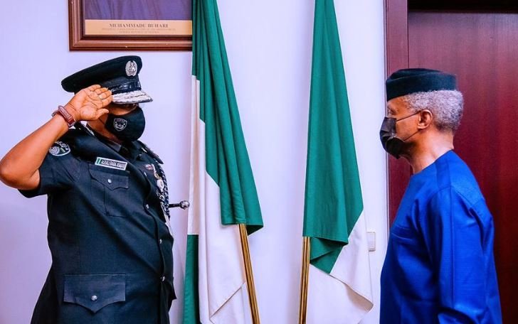 Vice President Yemi Osinbajo SAN decorates the new Acting Inspector General of the Nigerian Police Force Usman Alkali Baba at the State House, Abuja. 7th April, 2020. Photos; Tolani Alli