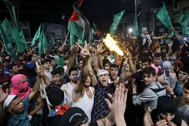 Palestinians poured onto the streets of Gaza soon after the truce began