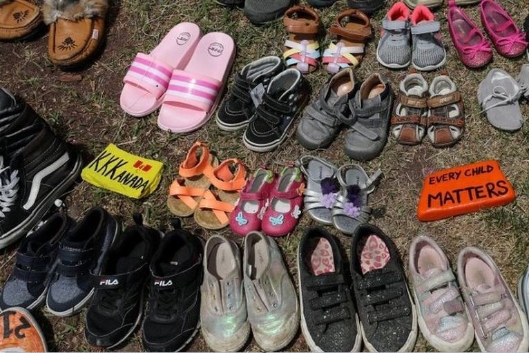 In recent weeks, people have placed children's shoes at memorials to mourn those who died at Canada's indigenous schools