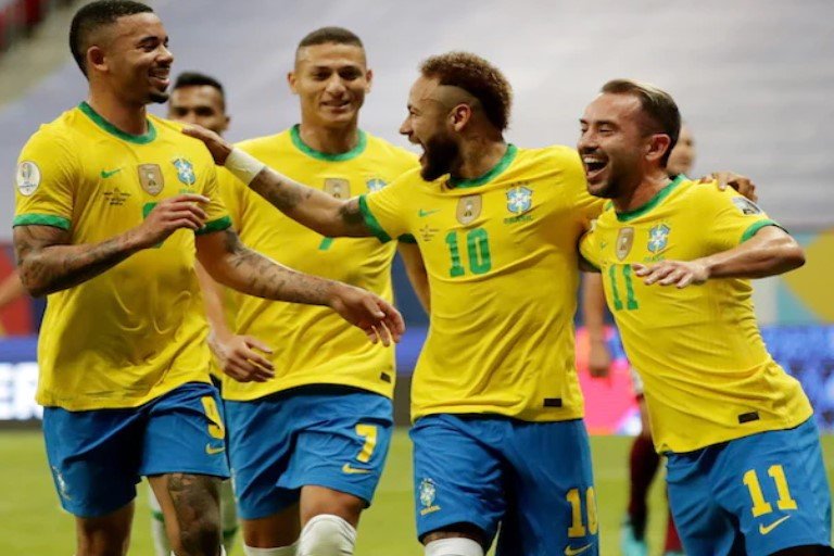 Neymar celebrates with Brazilian teammates