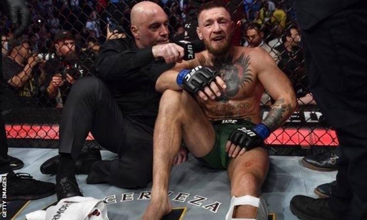 McGregor was treated in the ring by doctors, and still managed to fire angry comments at Poirier despite his injury