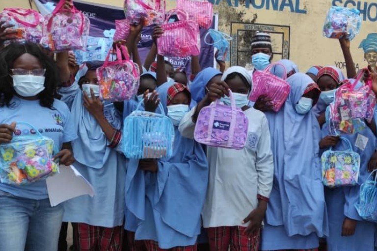 Some of the marginalized girls in IDP camps and secondary schools in the North-East receiving the menstrual period kits donated by Keystone Bank Limited.