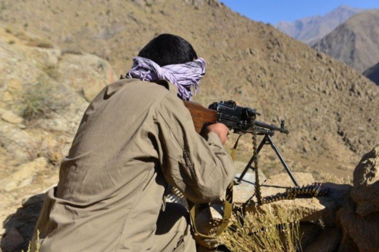 Afghan resistance fighter mans a machine gun in the Panjshir Valley