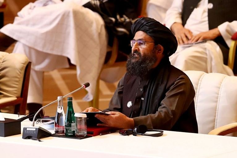 Mullah Abdul Ghani Baradar, the leader of the Taliban delegation, speaks during talks between the Afghan government and Taliban insurgents in Doha, Qatar September 12, 2020