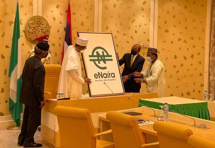 President Muhammadu Buhari unveiling the eNaira in Abuja on Monday