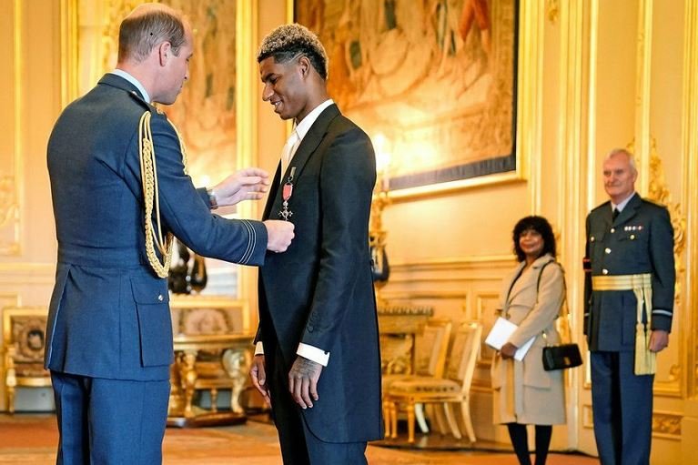 Marcus Rashford was honoured by the prince in front of his mother Melanie