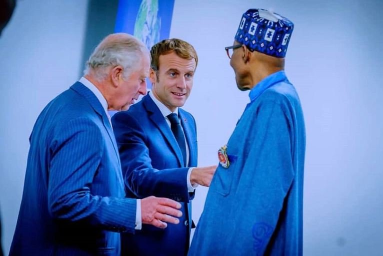 President Muhammadu Buhari having a chat with President Emmanuel Macron of France and Prince Charles at COP26