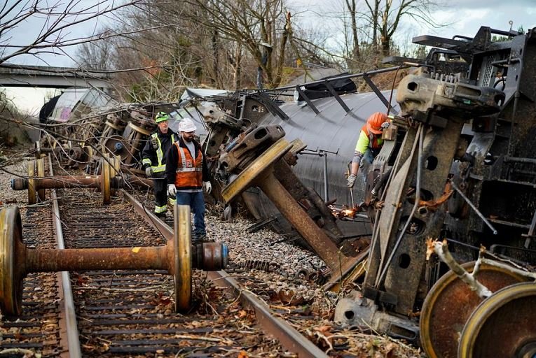 People work at the scene of a train derailment after a devastating outbreak of tornadoes ripped through several US states in Earlington, Kentucky, US