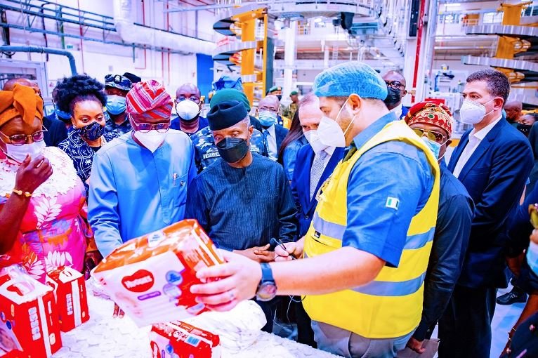 Vice President Yemi Osinbajo, SAN, along with Governor of Lagos State, Mr. Babajide Sanwo-Olu; and some Federal Ministers; commissions and tours the Kimberly-Clark Facility in Lagos State, Nigeria