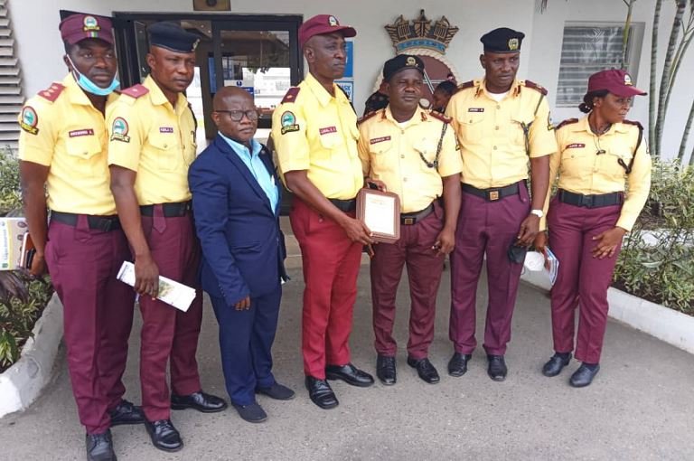 LASTMA officer Abdulwahab Lawal, recipient of Rotary Club of Lagos Peace Award with colleagues at the headquarters