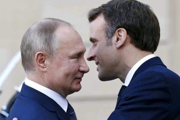 Mr Macron (right), seen here with Mr Putin in 2019, has previously called for a renewed relationship with Russia