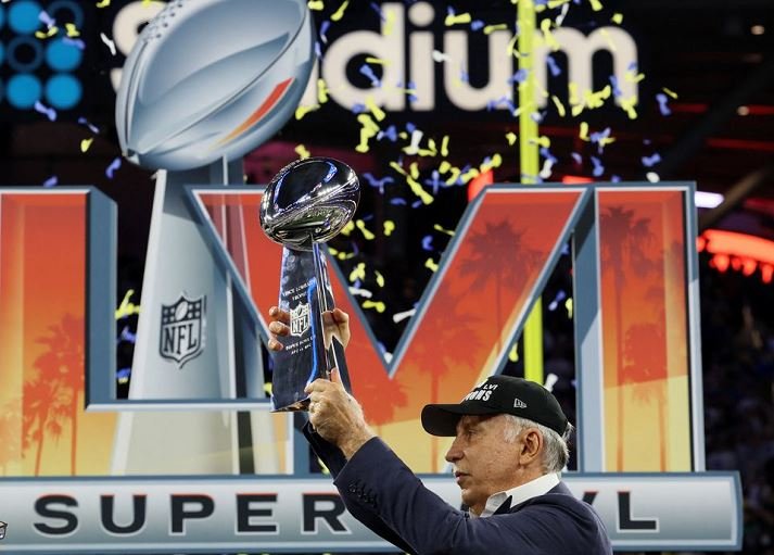 Stan Kroenke who owns Los Angeles Rams and Arsenal hold up the Super Bowl trophy