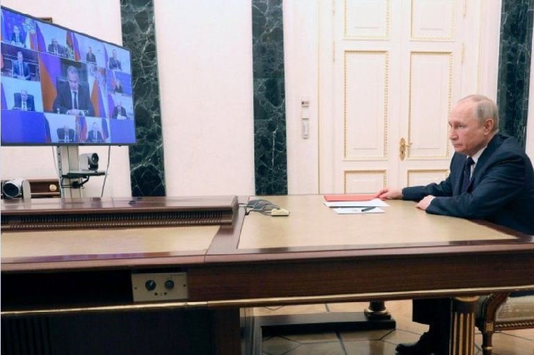 Vladimir Putin chaired the security council meeting via video link in Russia